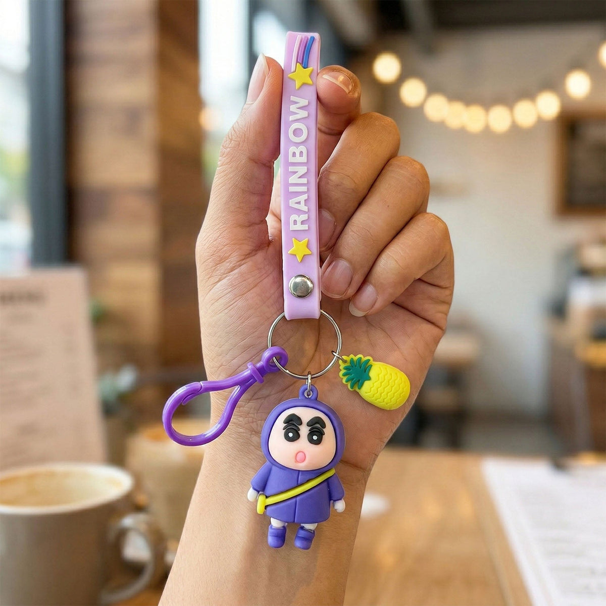 cute cartoon doll keychain with strap and pineapple charm Main image