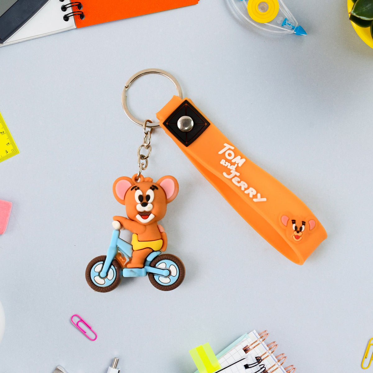 Collection of vibrant cartoon silicone keychains in various 3D character designs. Main image