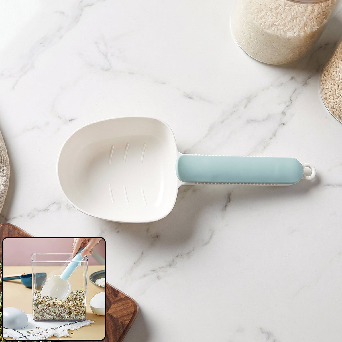 Image of a white plastic measuring spoon with a bag clip feature. Main image