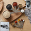 Plastic measuring cups and spoons set showing clear measurement markings