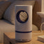 White Electric USB Mosquito Killer Lamp with UV light and suction fan.