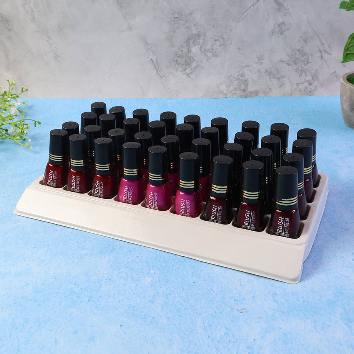 Clear blush nail polish bottle showcasing vibrant mix colors with glossy finish Main image