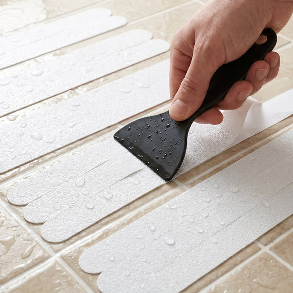 Easy-to-apply transparent bath safety strips with scraper tool