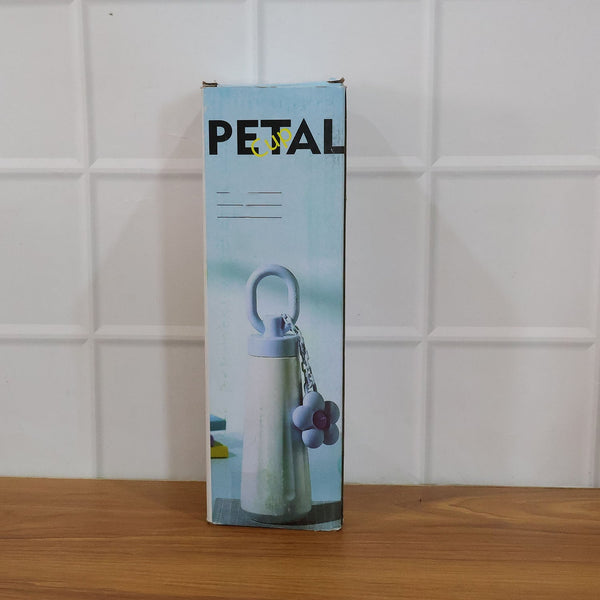 450ML portable water bottle placed in a natural outdoor setting