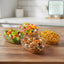 Stacked clear serving bowls in a durable multipurpose bowl set