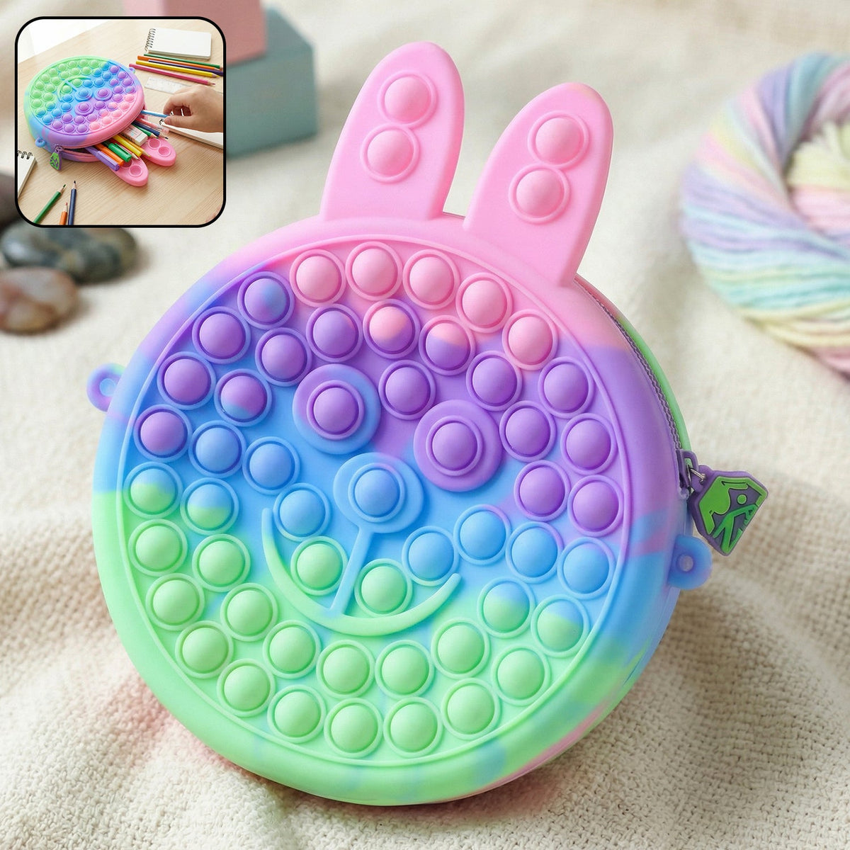 Cute caterpillar-shaped Pop It silicone pencil pouch with colorful design Main image