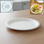 Disposable round food serving plate from Vegnar showing classic design