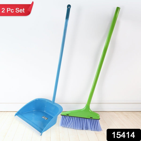 Close-up of dustpan teeth combing dust from brush bristles in dustpan and brush set