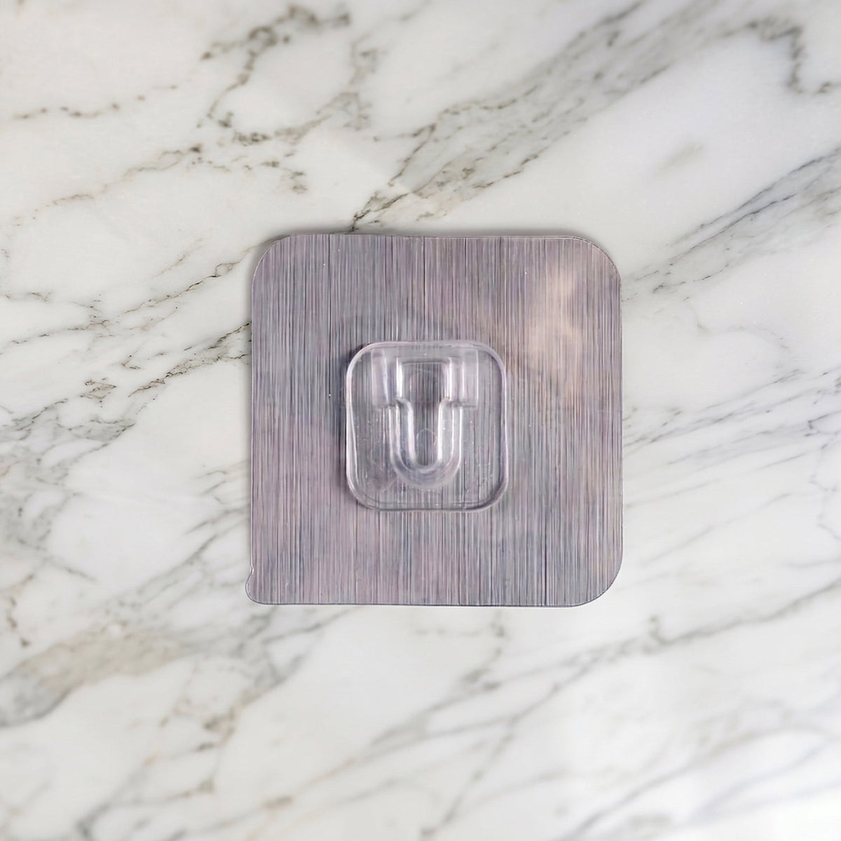 Transparent self adhesive wall hook for kitchen and bathroom organisation. Main image