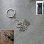 Om Namah Shivay engraved metal keychain with spiritual design