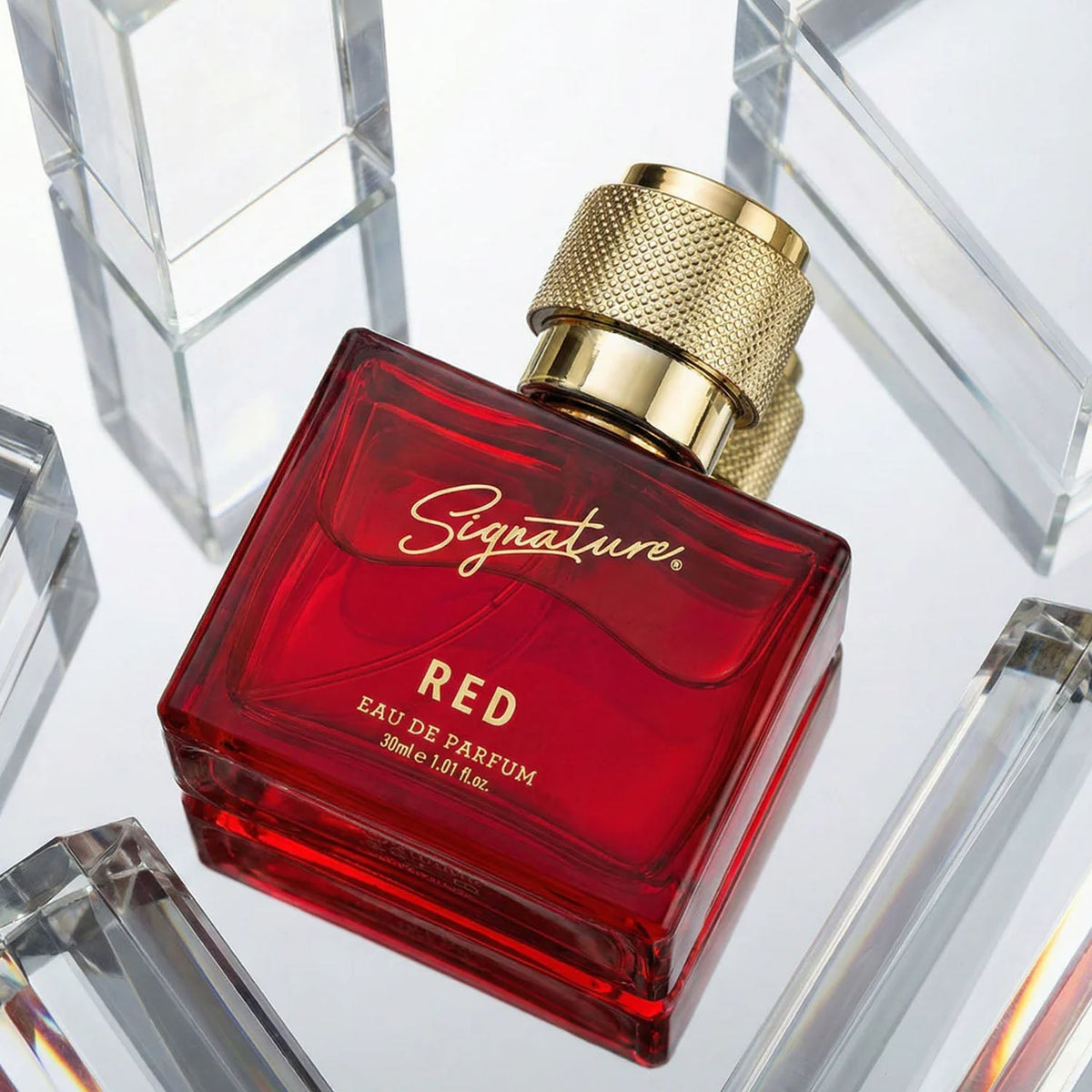 Signature premium red perfume spray bottle showing stylish design Main image