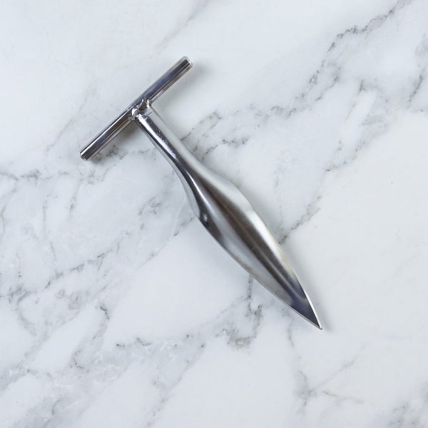 Stainless steel coconut breaker tool set displayed on a white background