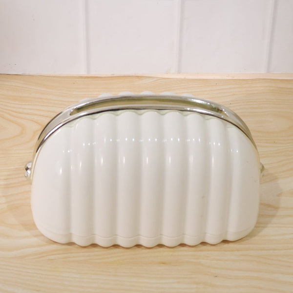 White shell style tissue dispenser front view