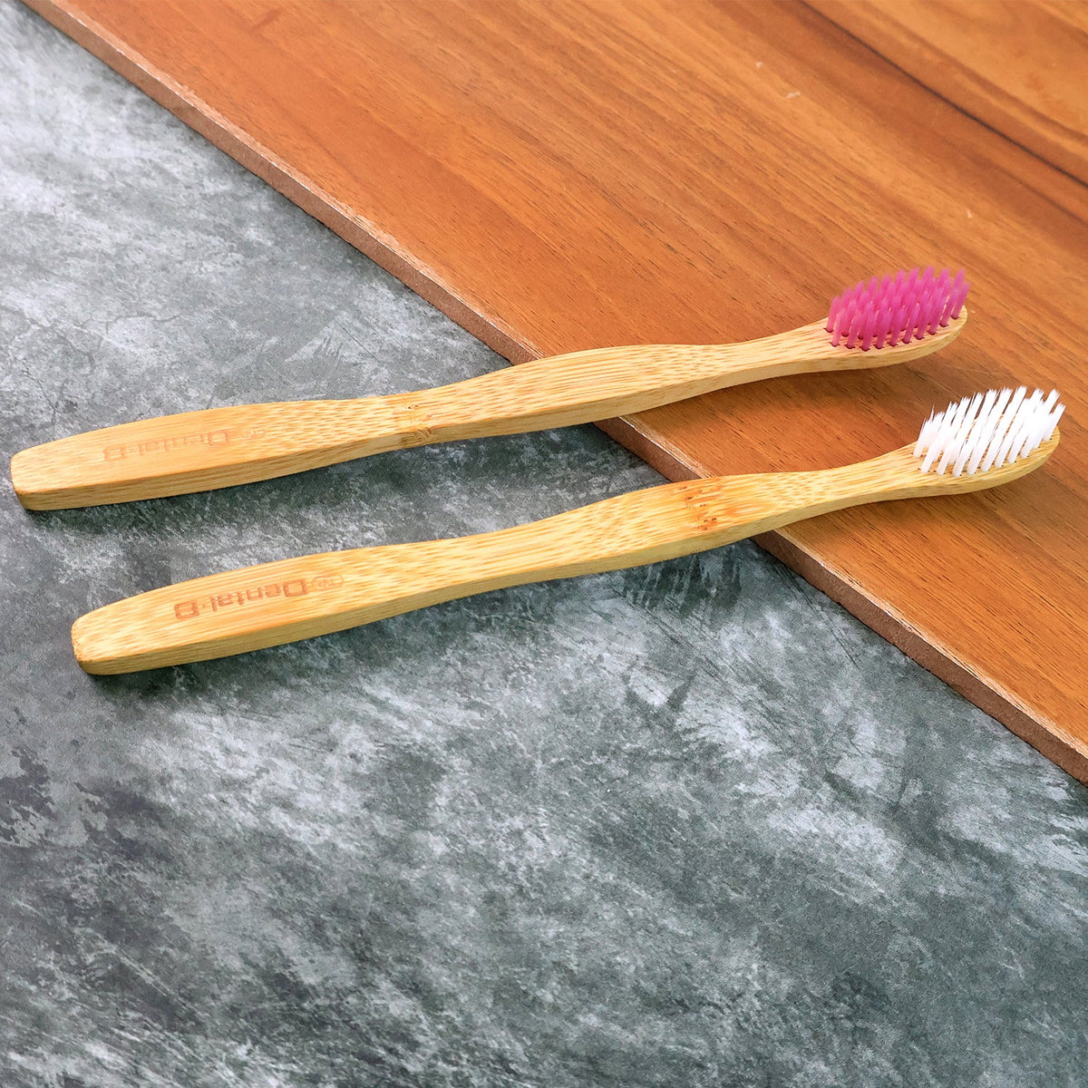 Eco-friendly bamboo toothbrush with medium bristles and biodegradable handle Main image