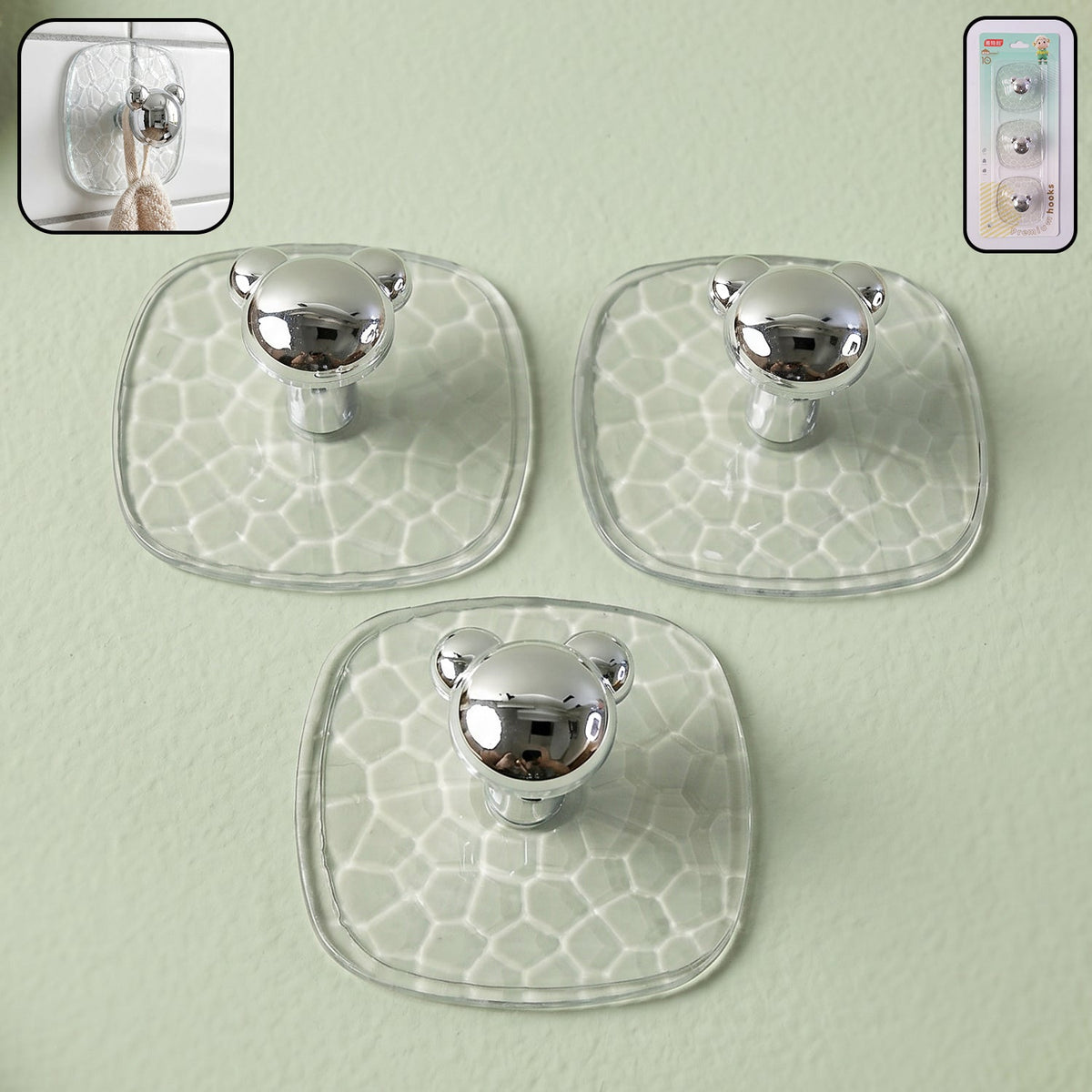 Strong clear adhesive wall hook holding keys and bags on a white wall. Main image