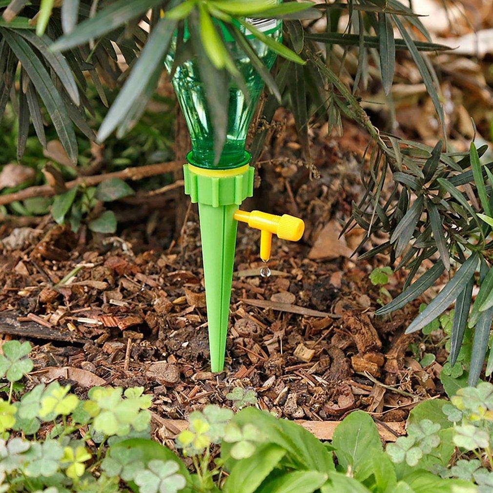 Drip irrigation kit with self-watering spikes installed in a plant pot. Main image