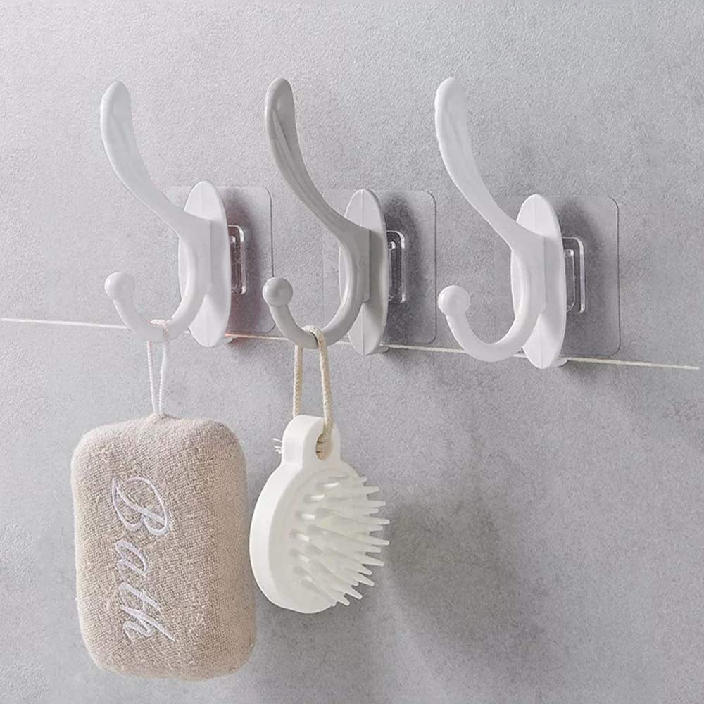 Close-up of a clear plastic self adhesive wall hook, ready for drill-free installation. Main image