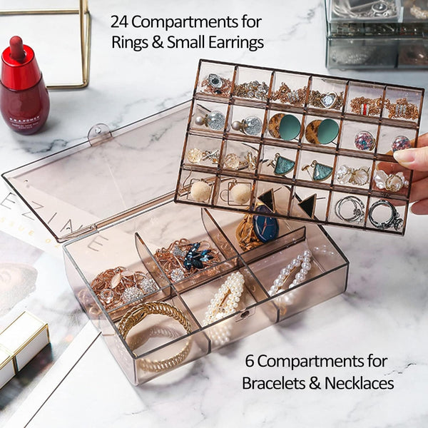 Open acrylic jewelry storage showing 24 small and 6 large compartments.