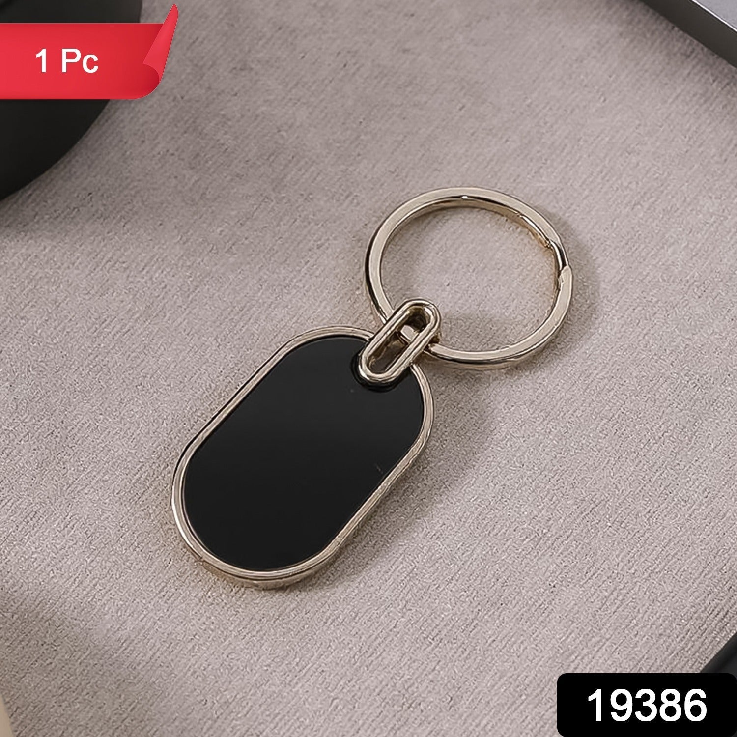 Oval Metal Keychain – Elegant Black & Silver Finish for Everyday Use Secondary image