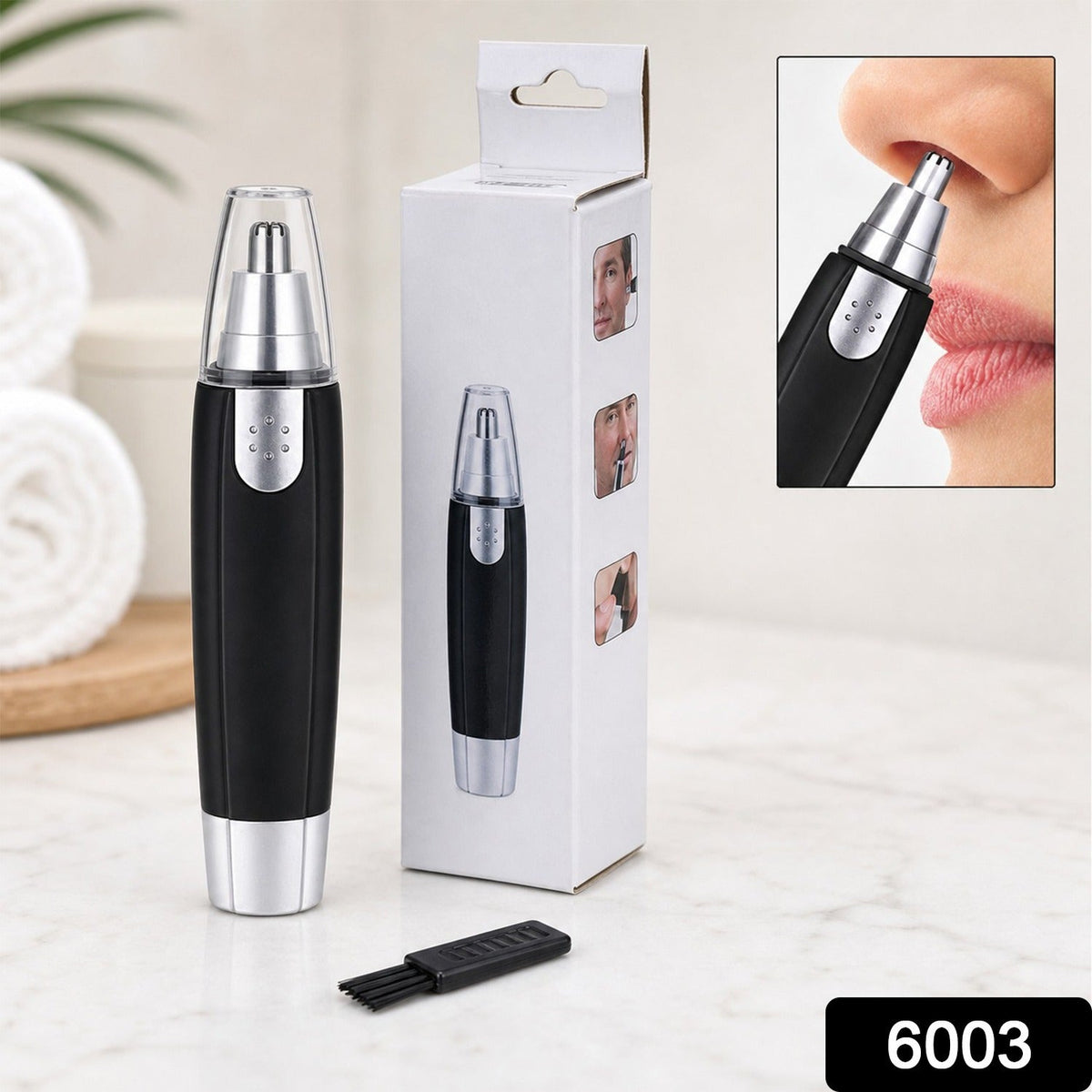 Close-up of the ear and nose hair trimmer showing its precise stainless steel blade. Main image
