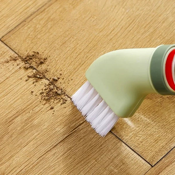 Compact cleaning brush with integrated scraper ideal for corners and tight spaces