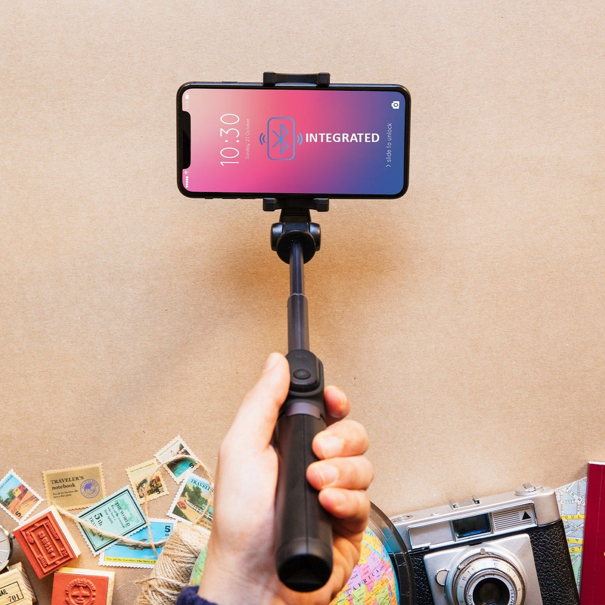Compact Bluetooth selfie stick with phone tripod stand. Main image