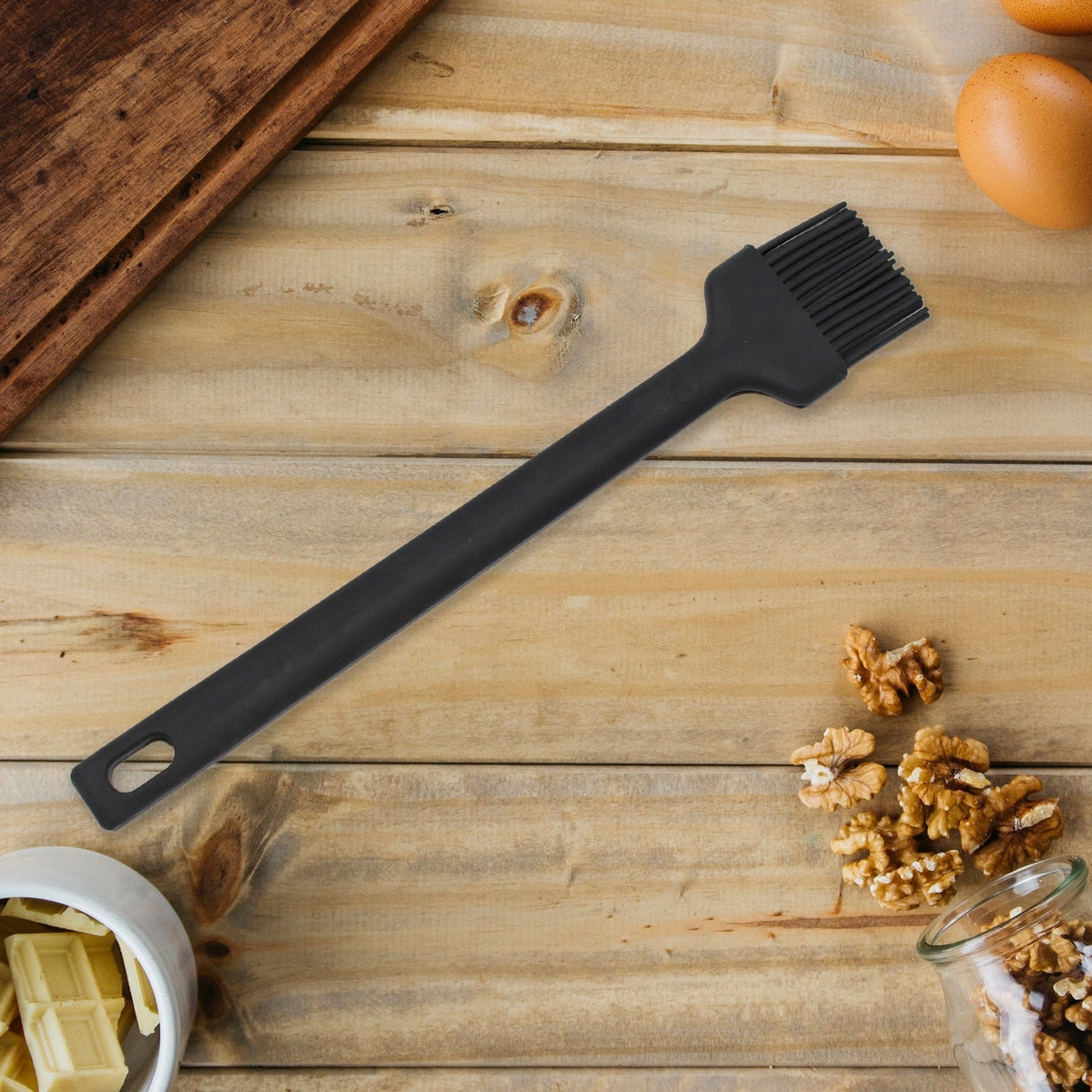 Vibrant red silicone basting brush, ideal for grilling and baking. Main image
