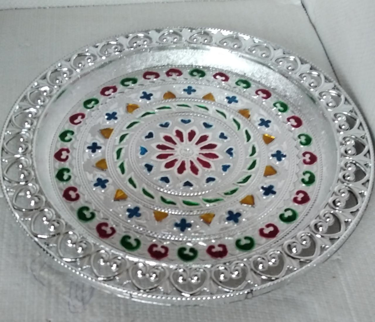 Elegant silver plated pooja thali, perfect for Indian traditional worship and ceremonies. Main image