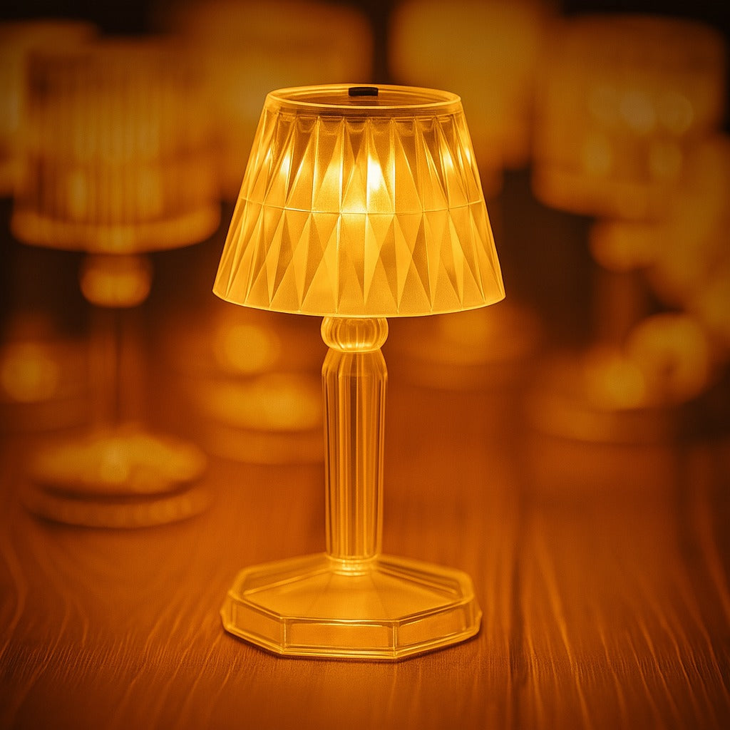 A close-up of the transparent crystal table lamp casting intricate light patterns. Main image