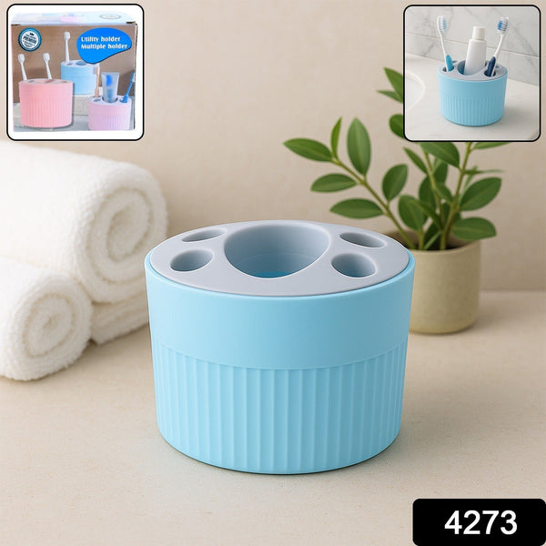 Bathroom toothbrush and utility organizer with multiple compartments