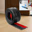 Silicone door bottom seal strip installed on door edge blocking dust and noise