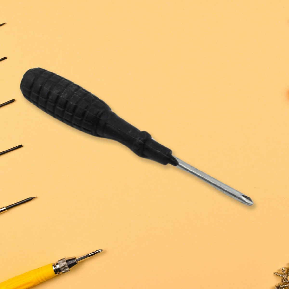 XcelGrip Phillips screwdriver with red and black handle, showing the cross-head tip. Main image