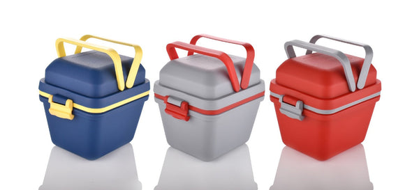 Side view of the durable plastic lunch box, highlighting its handle and push lock.