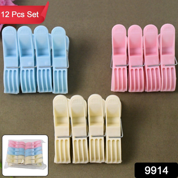 Assorted brightly colored plastic cloth clips spread out for household use