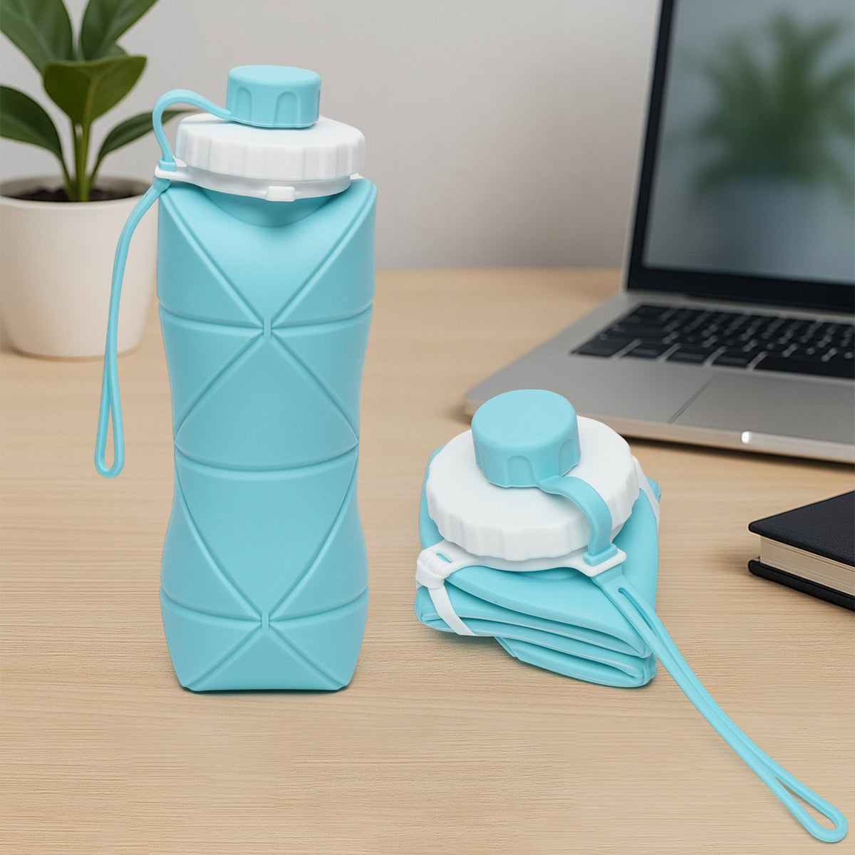 600ml collapsible silicone water bottle folded for easy portability Main image