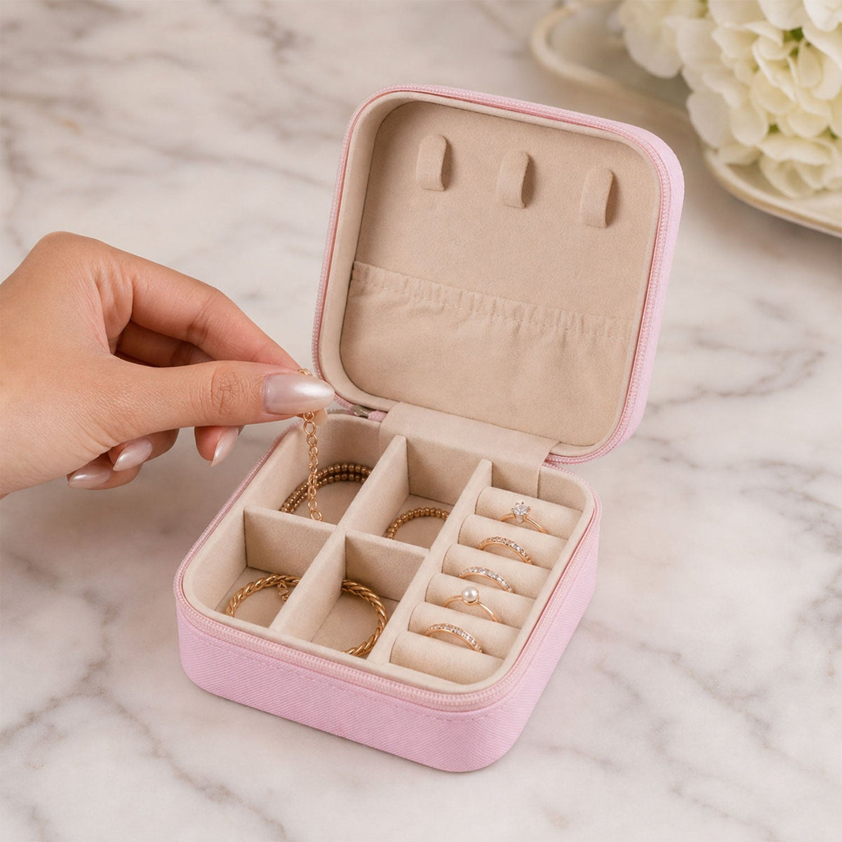 A closed LilyGleam Mini PU Leather Travel Jewellery Box in a stylish pink shade, perfect for organising accessories. Main image