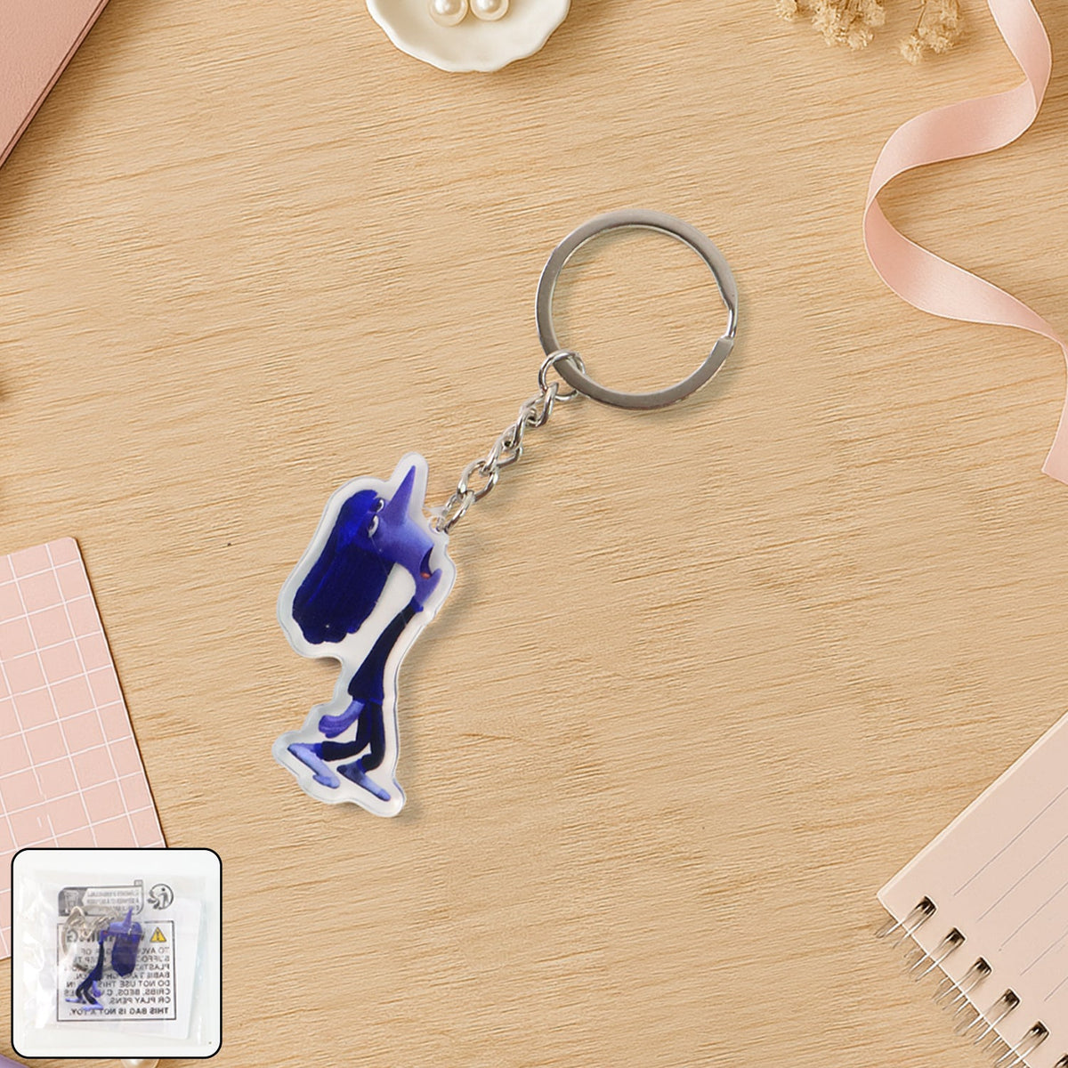 Glossy cartoon character acrylic keychain with fun expression attached to keyring Main image