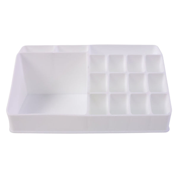 Pull-out drawer of the clear makeup organiser holding compacts and small items.
