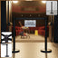 Heavy duty retractable belt crowd control pole with sturdy base for queue management